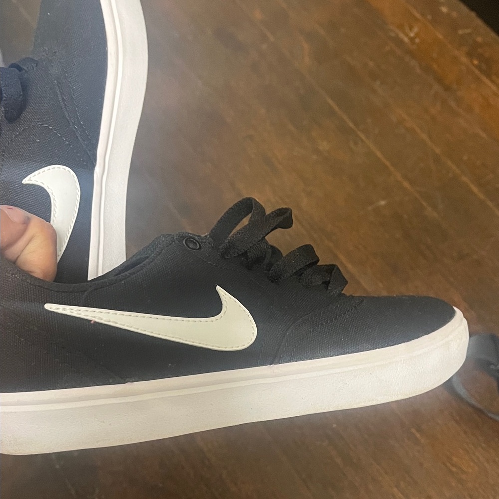 Nike Women’s SB Black Sneakers with White Swoosh